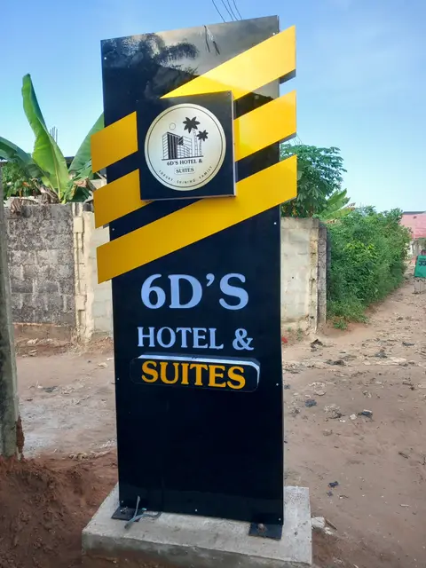 Black and gold totem sign fabricated for 6D's Hotel & Suites in Irete Owerri